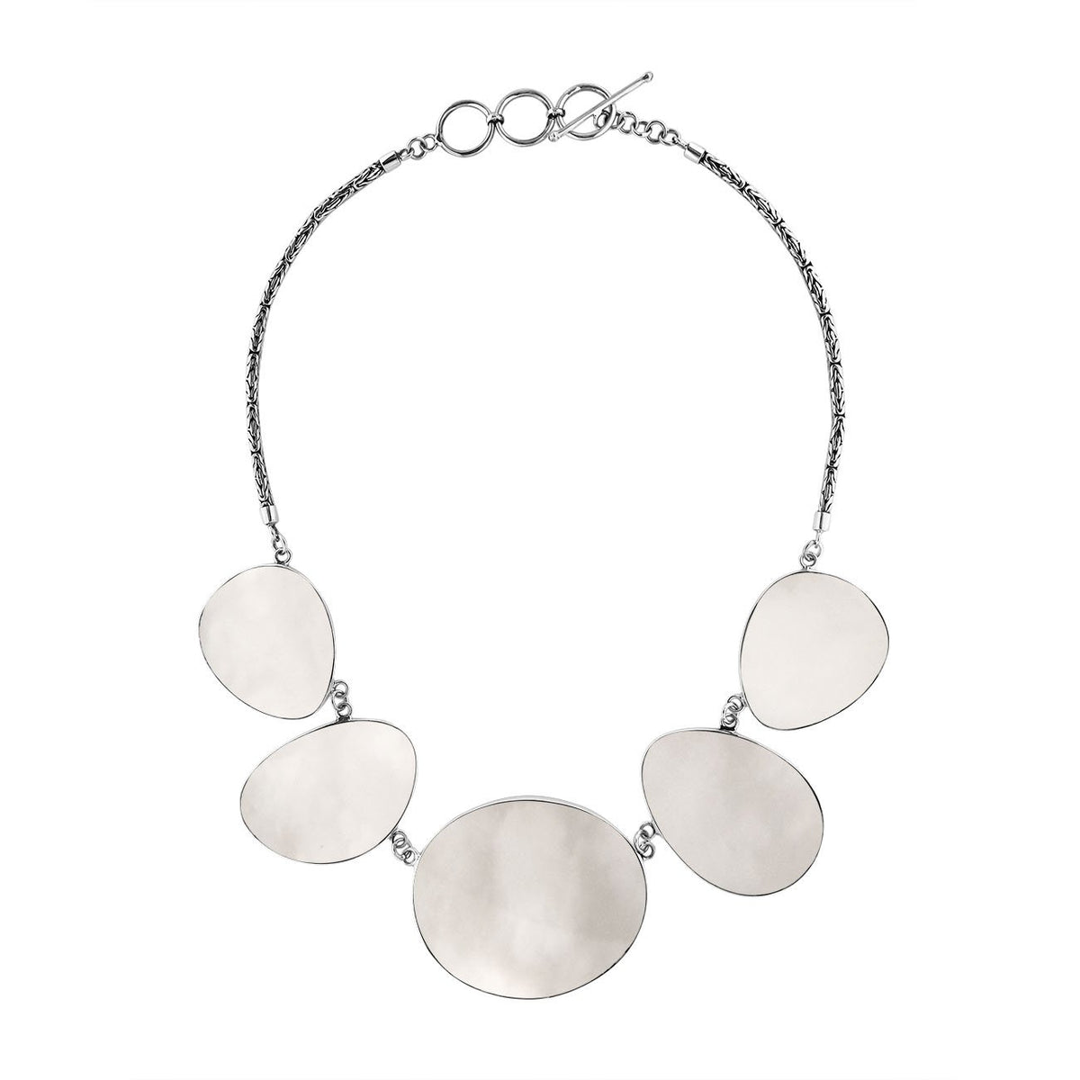 Handcrafted silver necklace with oval Mother of Pearl shell links in elegant artisan design.