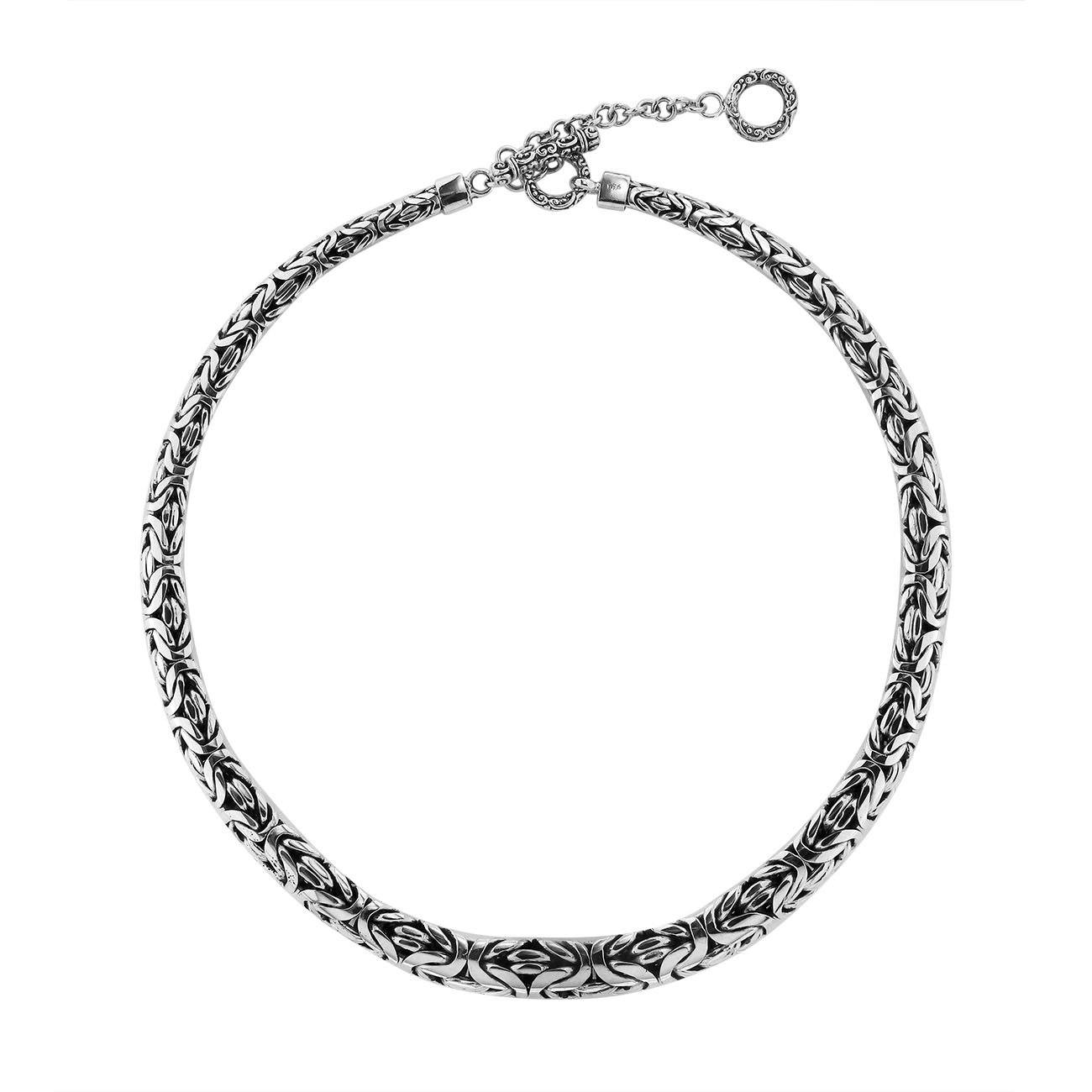 Handcrafted sterling silver graduated woven necklace with intricate design, polished-oxidized finish, and artisan clasp, made in Bali.