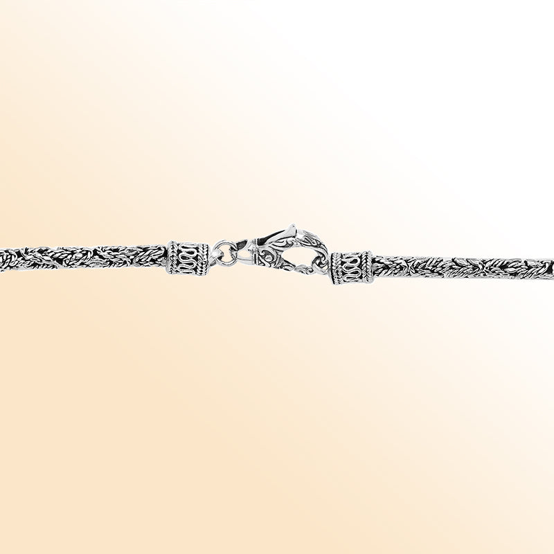 Handcrafted Bali 4MM sterling silver chain with detailed woven design and lobster clasp closure.