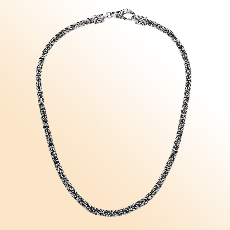 Handcrafted Bali 4MM sterling silver chain with detailed woven design and lobster clasp closure.