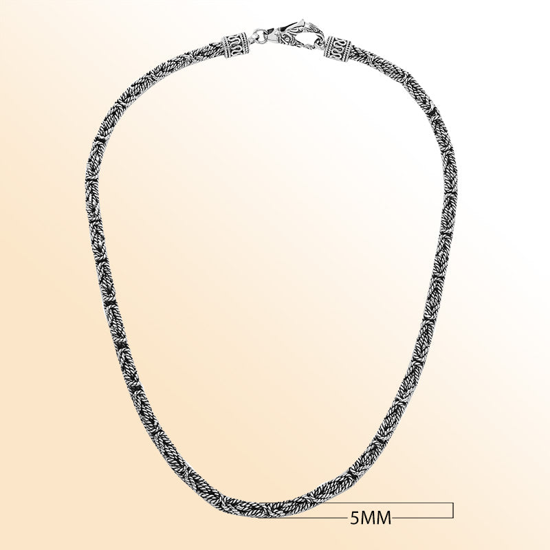 Handcrafted Bali 5MM sterling silver chain with woven design and lobster clasp closure.