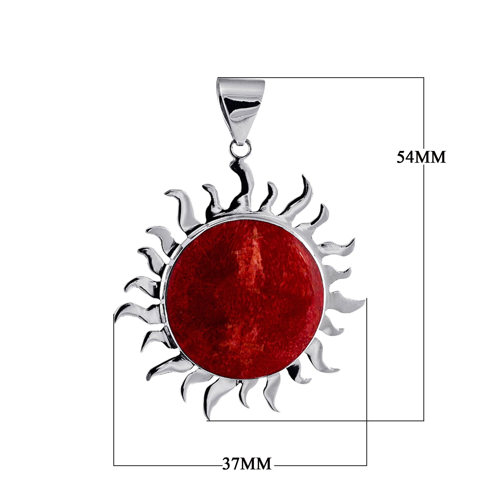 Handcrafted sterling silver sun pendant with vibrant red coral centerpiece, artisan Bali jewelry for bold everyday style.