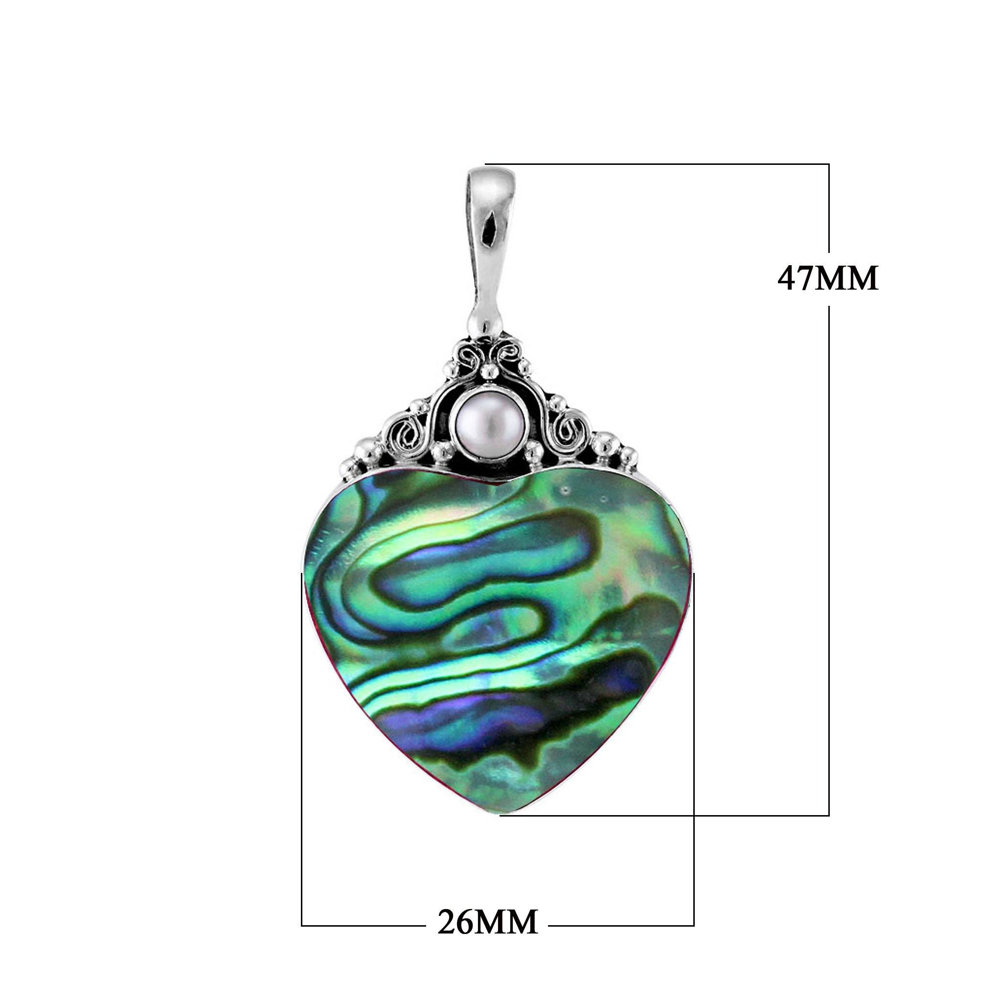 Handcrafted sterling silver heart pendant with shimmering abalone shell and luminous Mother of Pearl accent, artisan Bali jewelry with ocean-inspired elegance.