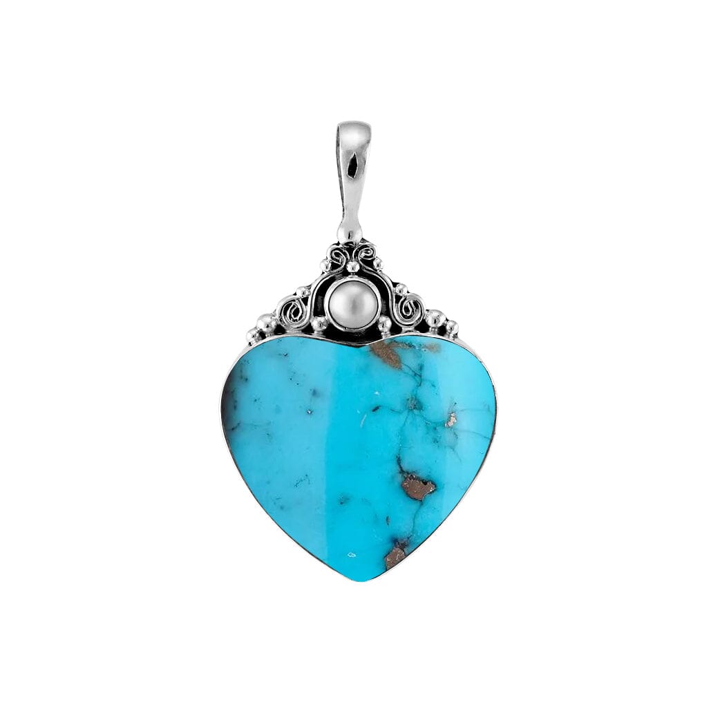 Handcrafted sterling silver heart pendant with vibrant turquoise gemstone and luminous Mother of Pearl accent, artisan Bali jewelry for timeless elegance.