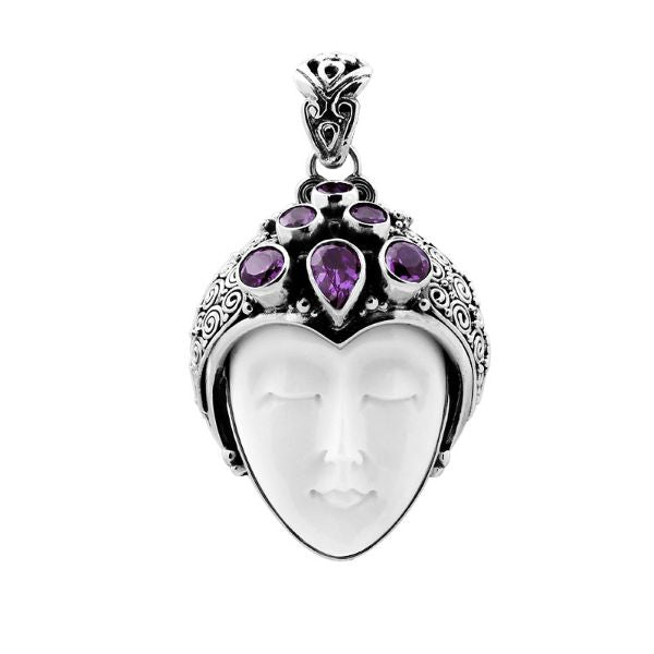 Sterling silver pendant with hand-carved bone face and purple amethyst gemstones, unique Bali artisan jewelry.