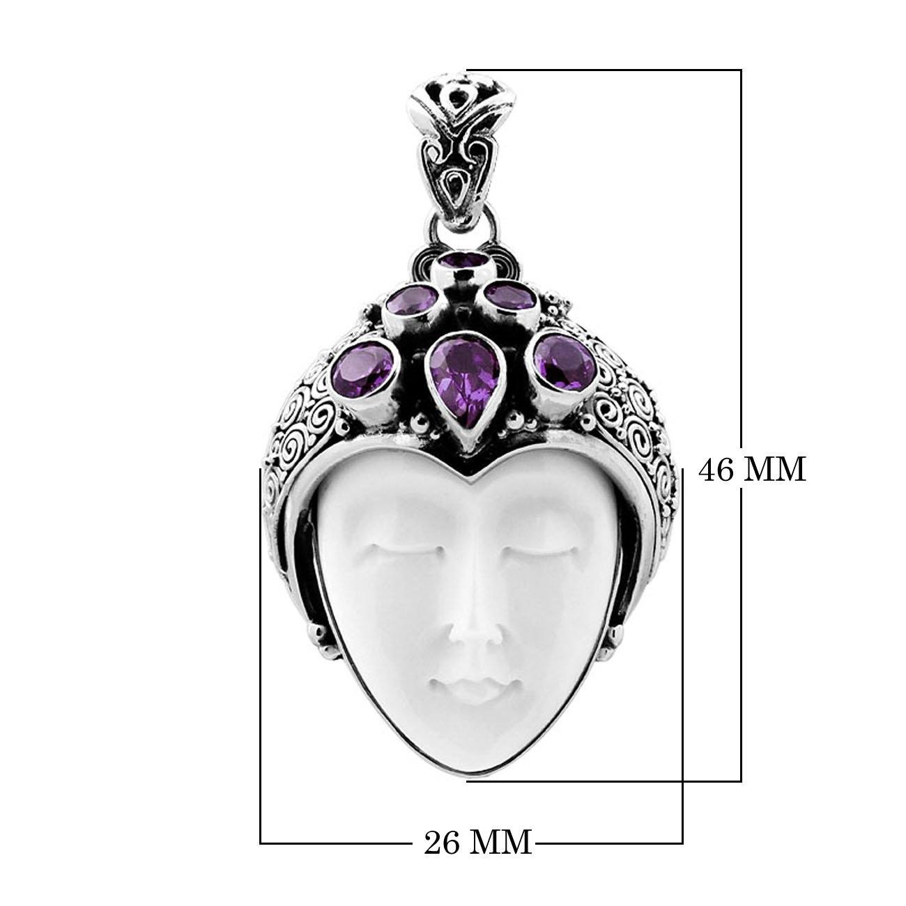 Sterling silver pendant with hand-carved bone face and purple amethyst gemstones, unique Bali artisan jewelry.