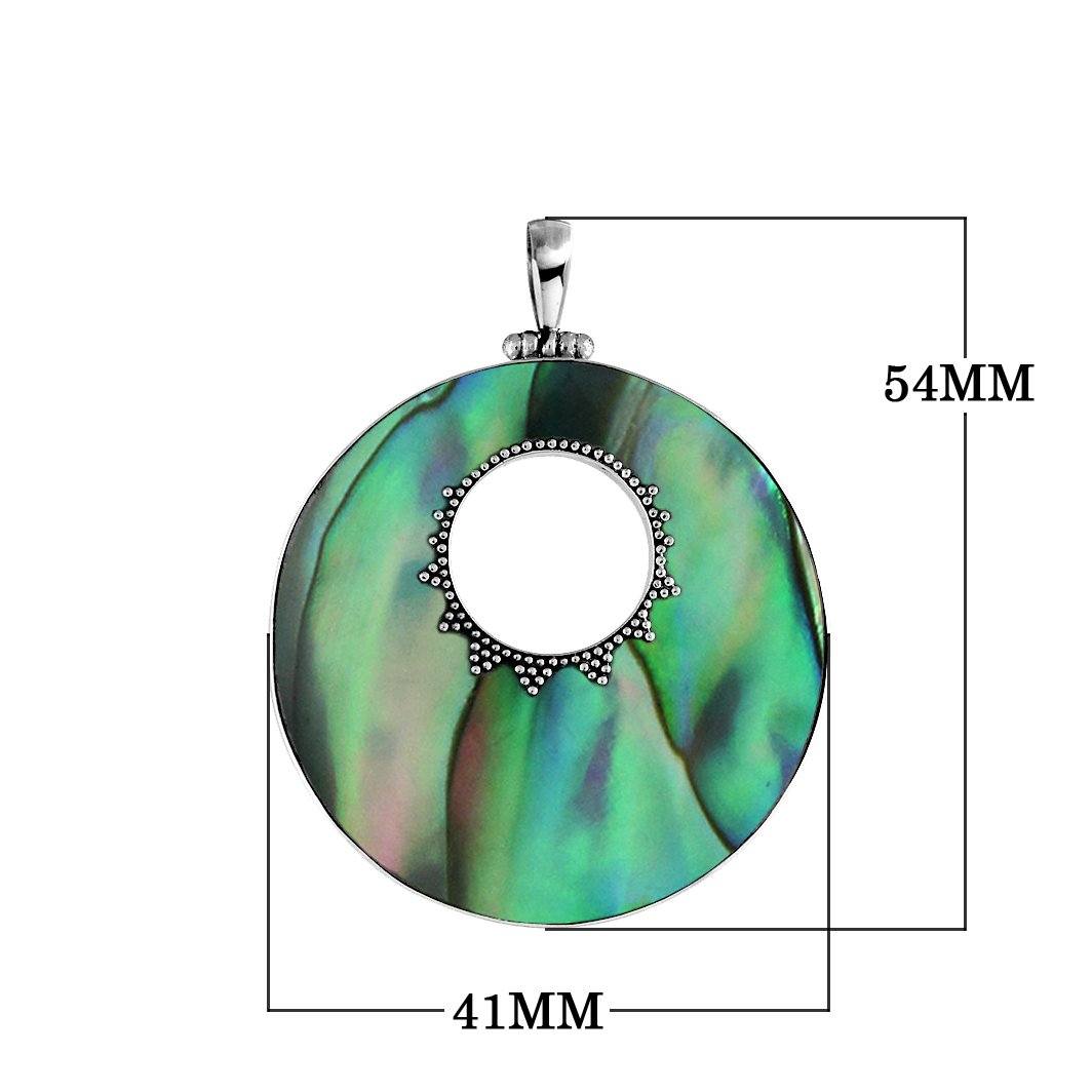 Sterling silver round Abalone shell pendant with shimmering blue-green inlay, center cut-out design, and oxidized dot accents, handcrafted artisan jewelry for women.