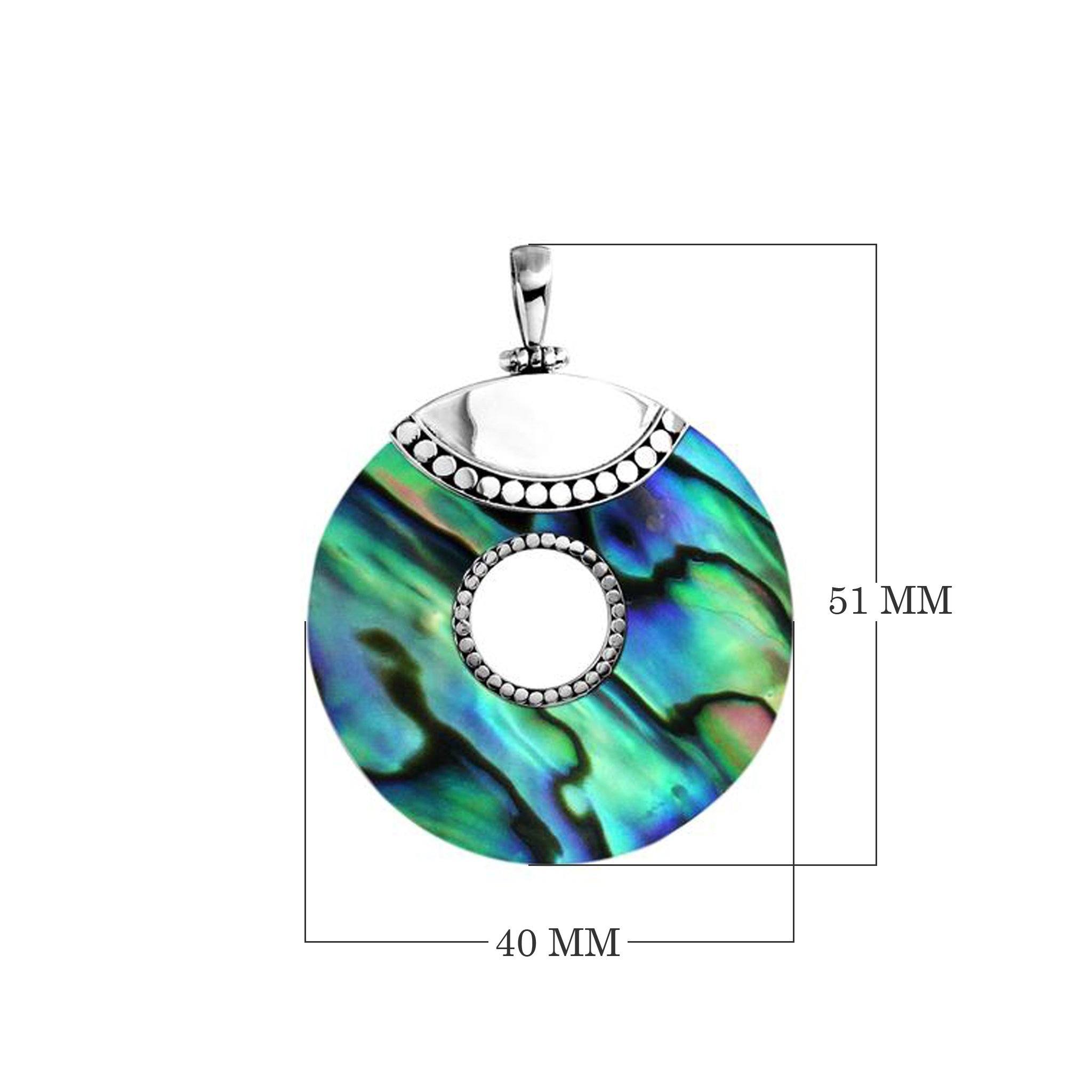 Sterling silver round Abalone Shell pendant with shimmering iridescent colors, center cut-out, and Bali beaded detailing, handcrafted artisan jewelry for women.