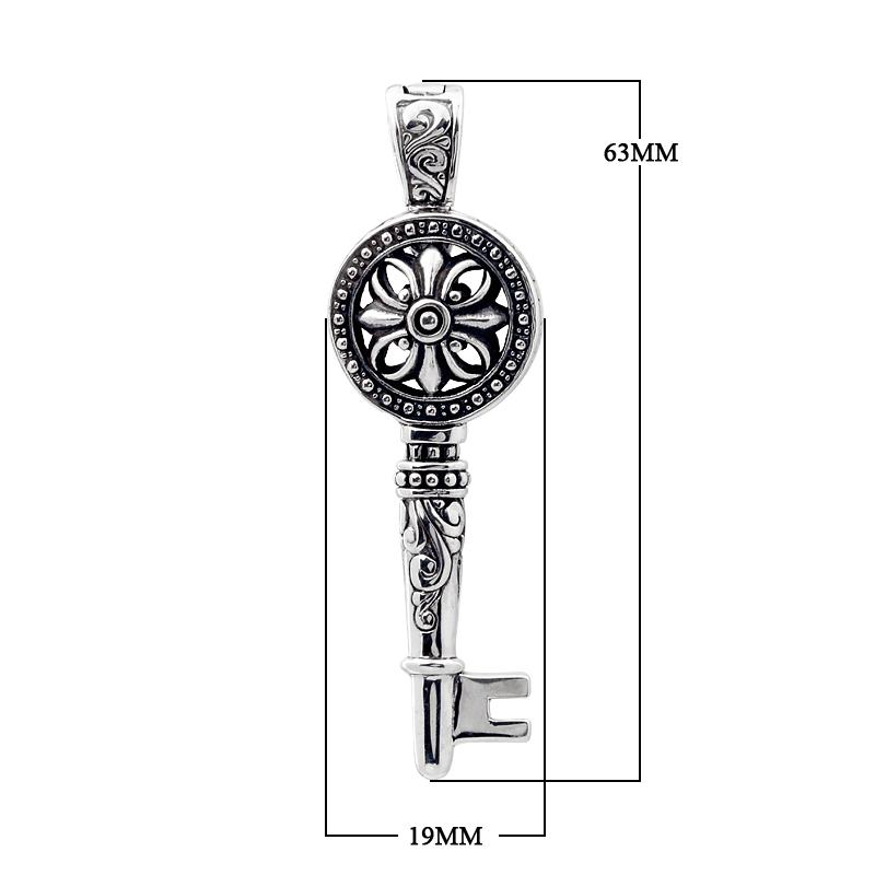 Sterling silver key pendant with handcrafted Bali floral design – symbolic jewelry gift of love, luck, and new beginnings