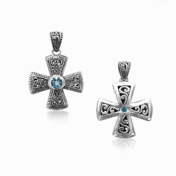 Sterling silver cross pendant with Blue Topaz gemstone – handcrafted Bali jewelry symbolizing faith, elegance, and timeless style