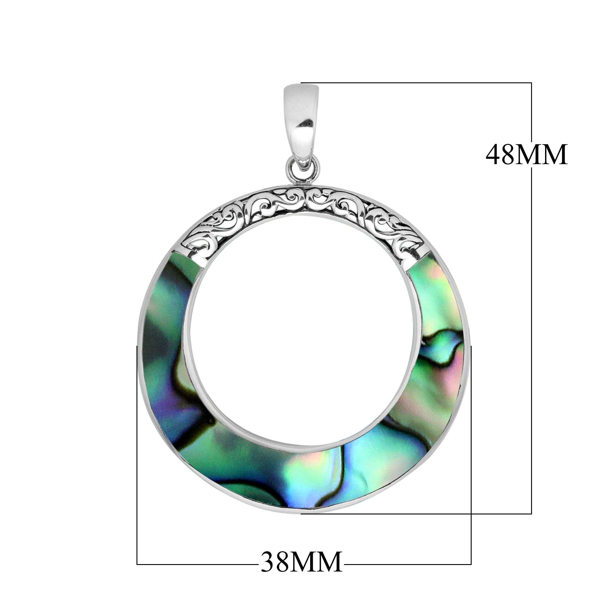 Sterling silver round pendant with abalone shell inlay, open circle design, and ornate silver carving – handcrafted artisan jewelry