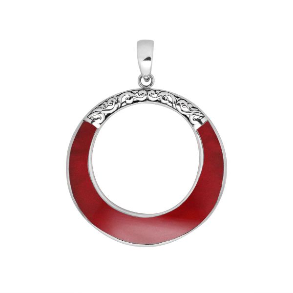 Round red coral pendant in sterling silver with open circle design and ornate detailing, handcrafted artisan jewelry