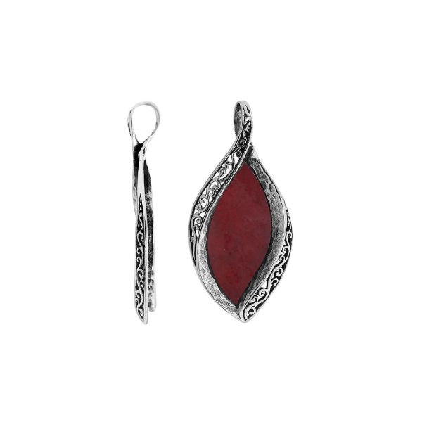 Sterling silver marquise pendant with vibrant red coral inlay and detailed Balinese carving, handcrafted in Bali.