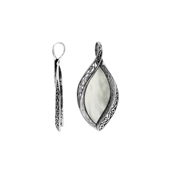 Sterling silver marquise pendant with luminous Mother of Pearl inlay and detailed Balinese carving, handcrafted in Bali.