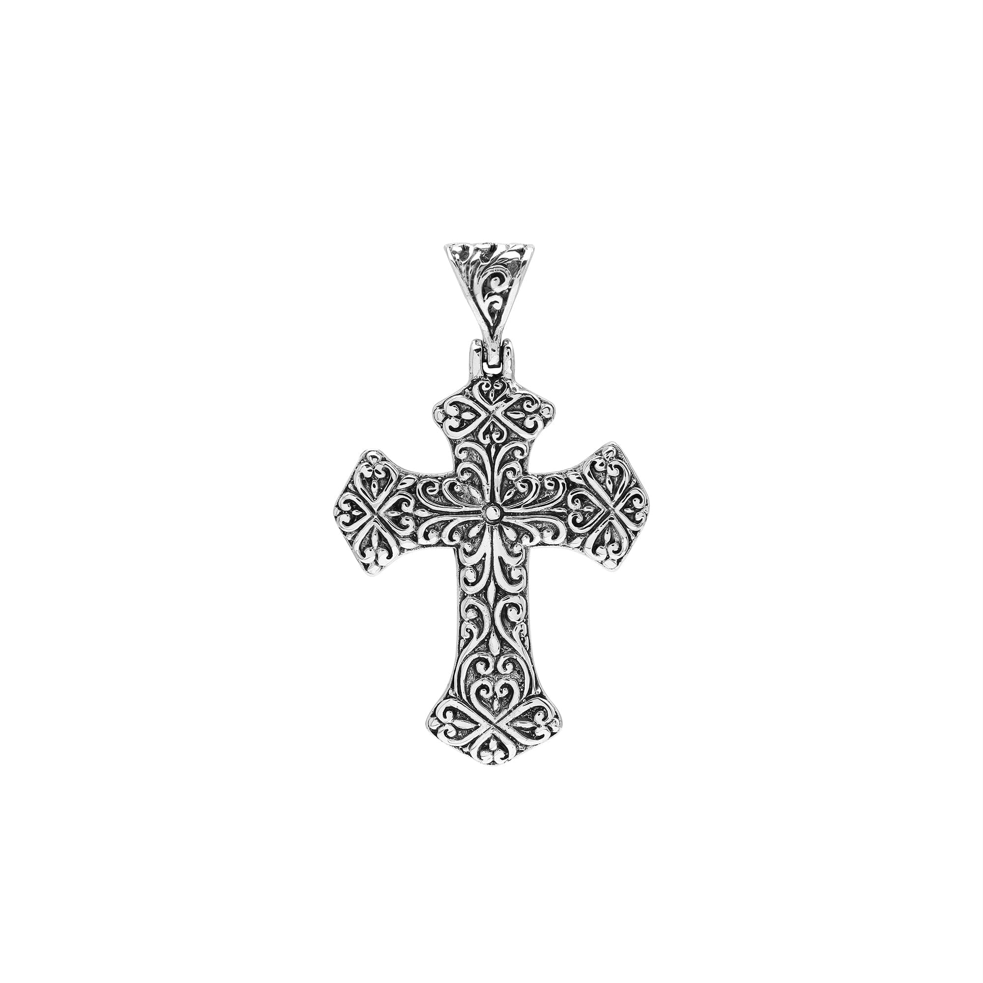 Sterling silver cross pendant with detailed scrollwork and oxidized accents, handcrafted Bali artisan jewelry for elegant spiritual style.