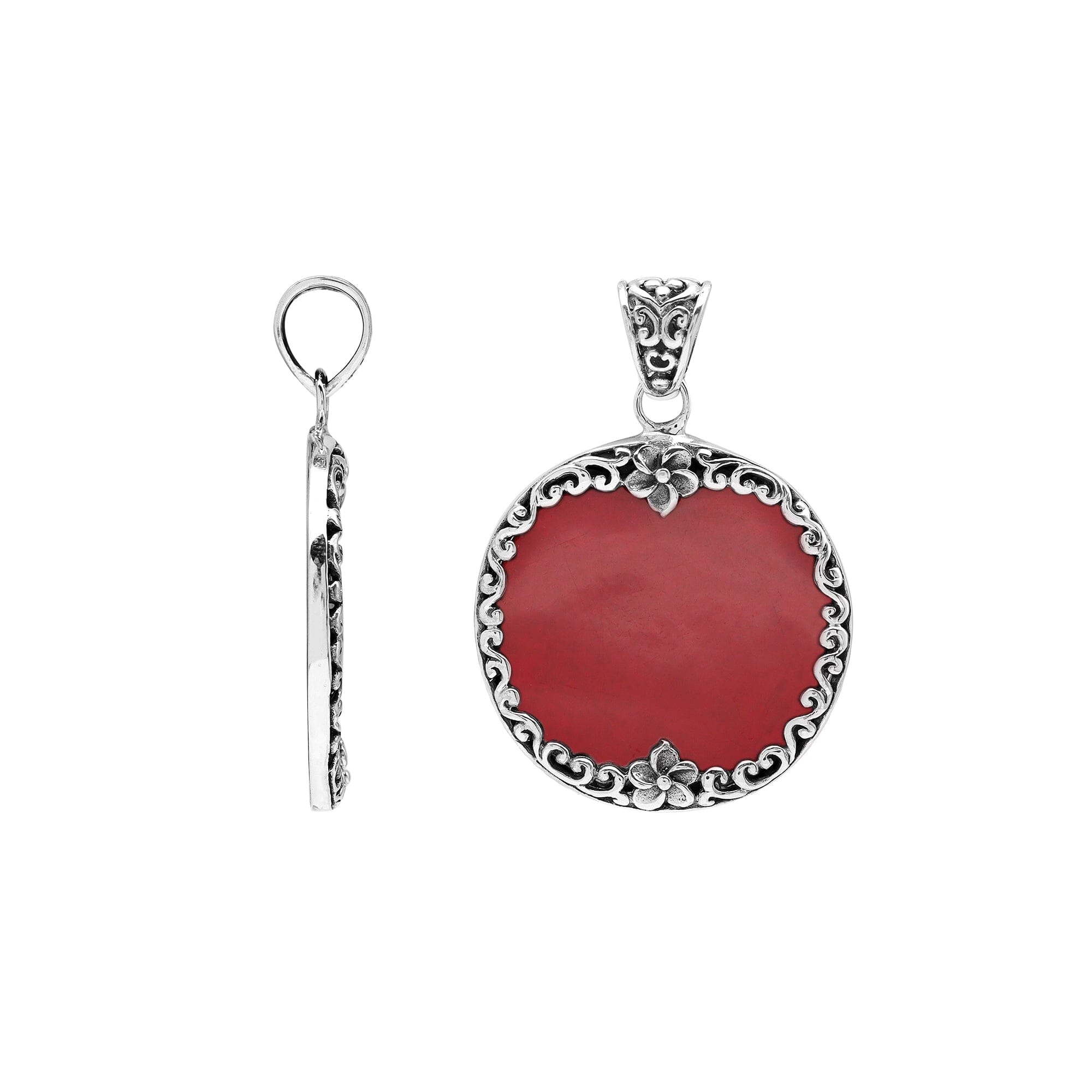 Sterling silver pendant with round red coral gemstone and floral Bali frame, handcrafted artisan jewelry for elegant everyday wear.