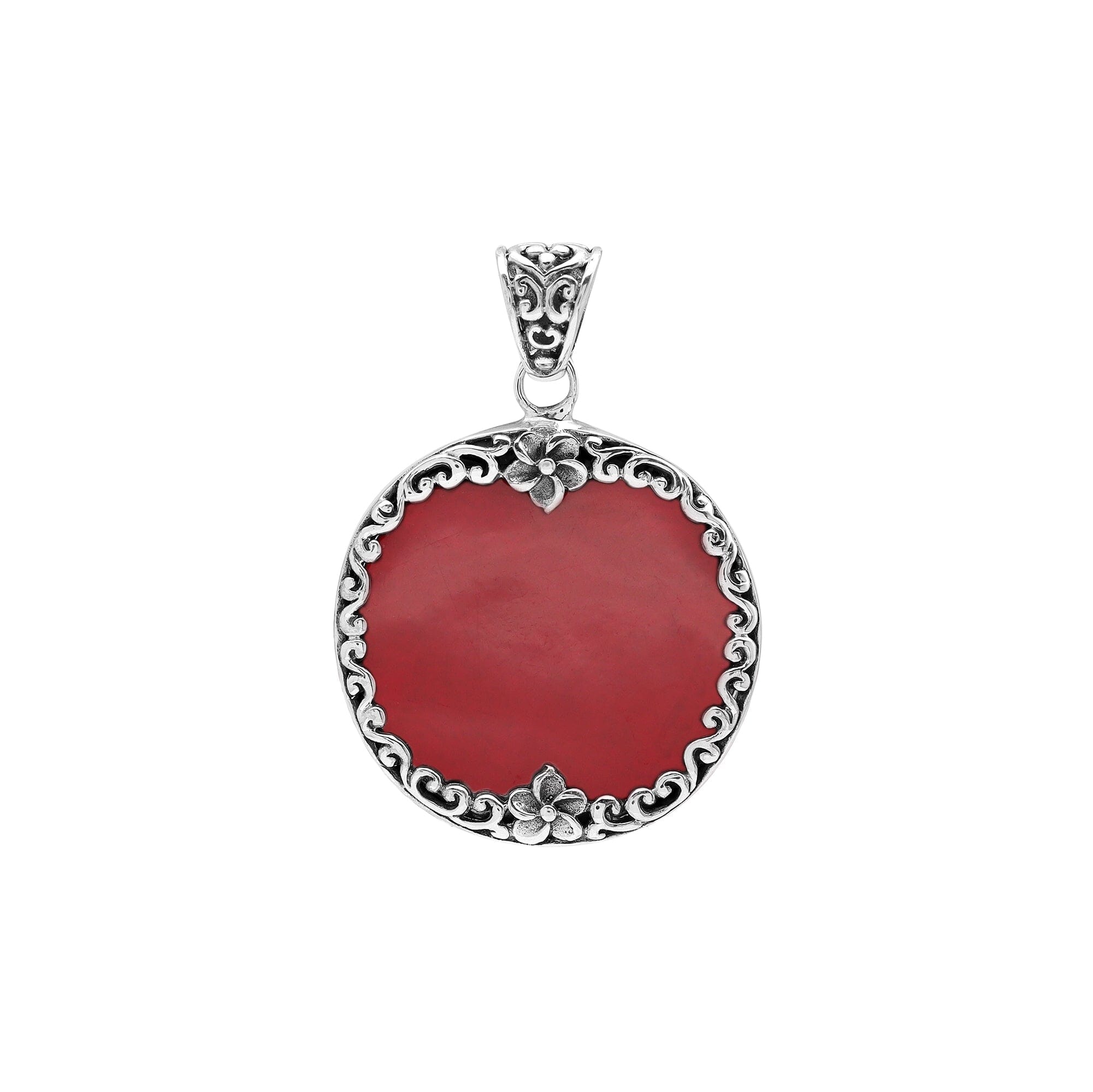Sterling silver pendant with round red coral gemstone and floral Bali frame, handcrafted artisan jewelry for elegant everyday wear.