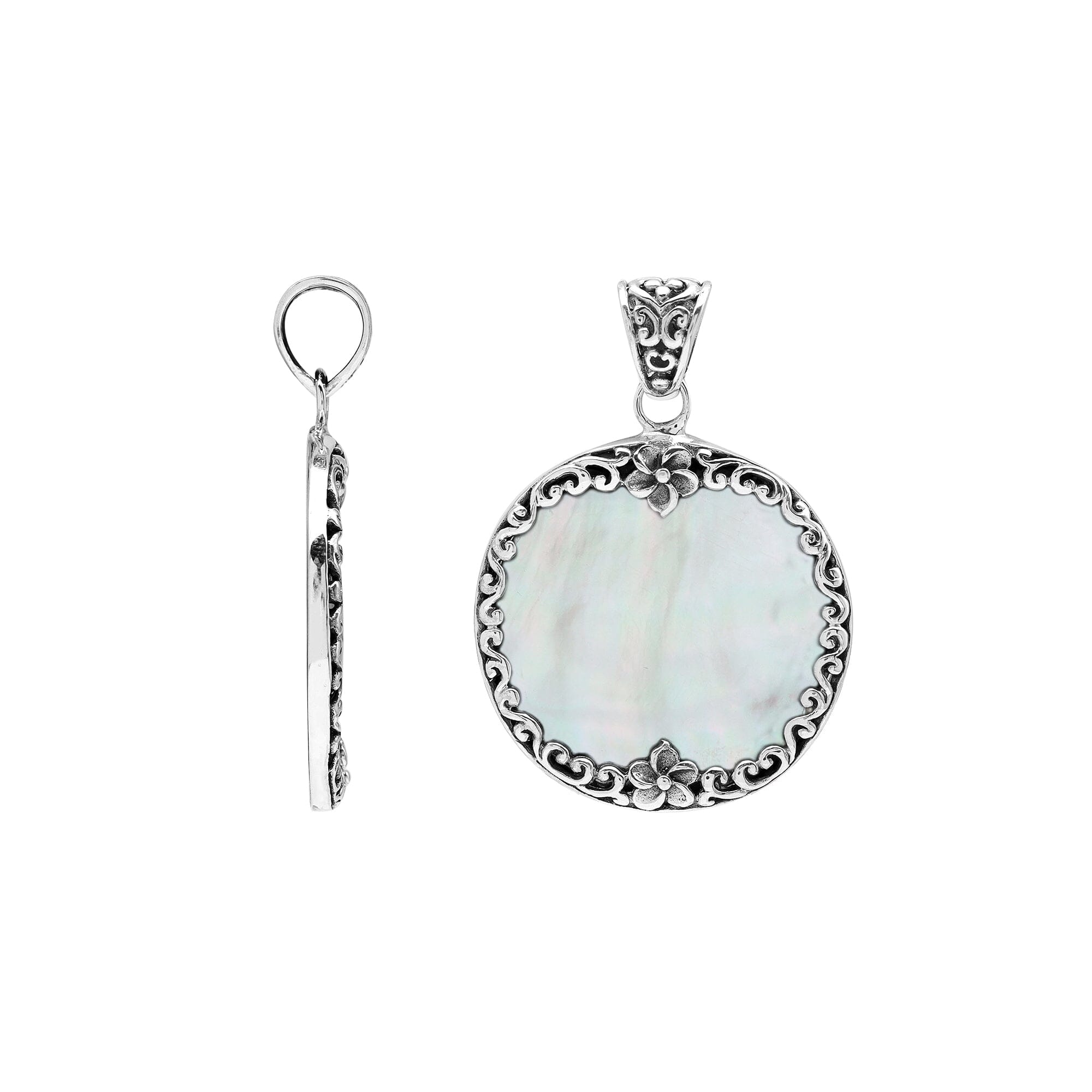 Sterling silver round pendant with luminous mother of pearl and floral Bali frame, handcrafted artisan jewelry for elegant everyday wear.