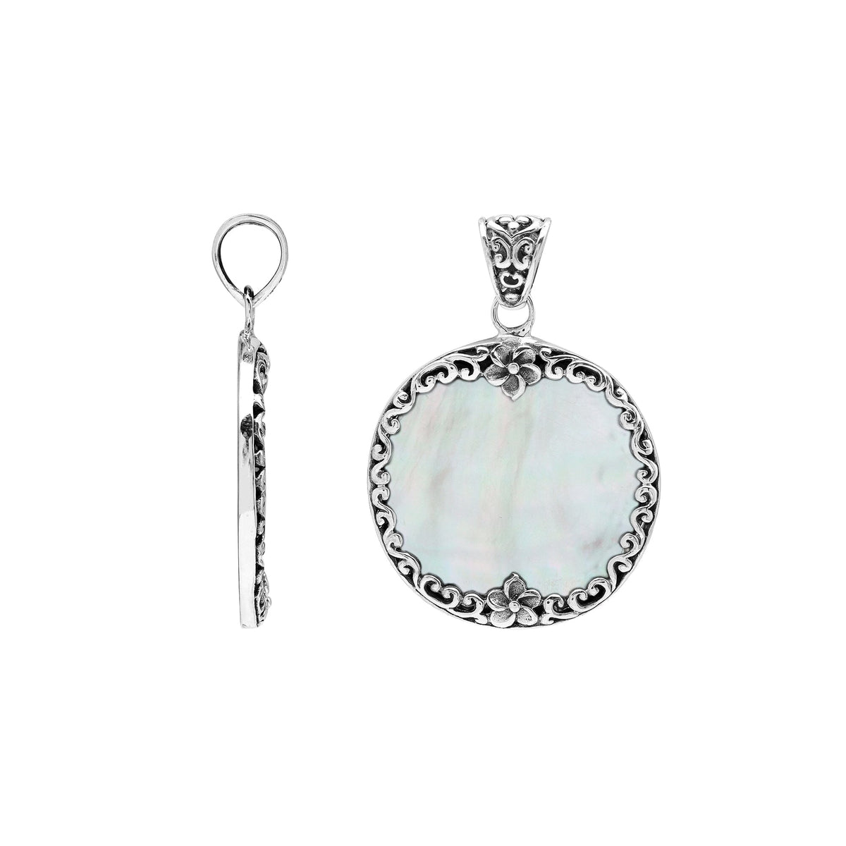 Sterling silver round pendant with luminous mother of pearl and floral Bali frame, handcrafted artisan jewelry for elegant everyday wear.