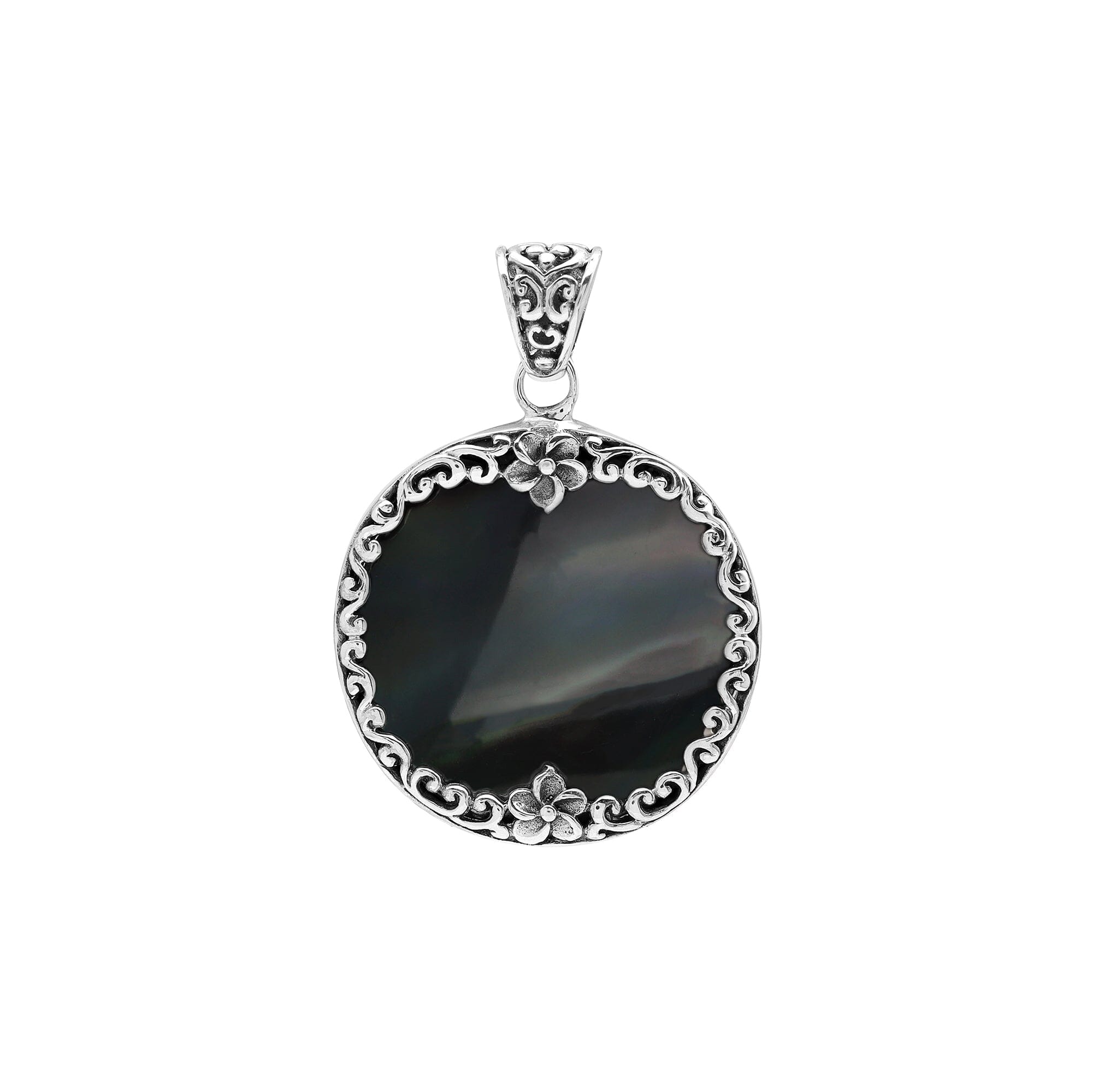 Sterling silver round pendant with glossy black shell and floral Bali detailing, handcrafted artisan jewelry for elegant everyday wear.