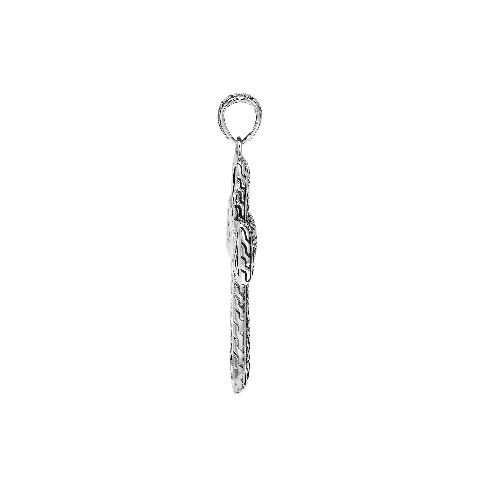 Handcrafted sterling silver ornate cross pendant with detailed Balinese scrollwork, elegant artisan jewelry for women.