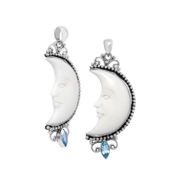 Crescent moon face pendant in sterling silver with carved bone and sparkling blue topaz accent, handmade in Bali.