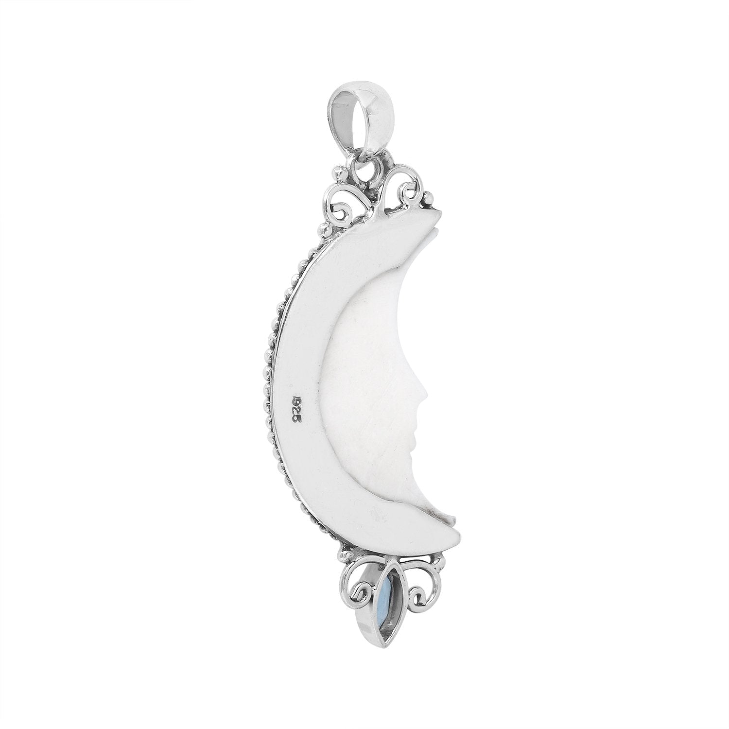 Crescent moon face pendant in sterling silver with carved bone and sparkling blue topaz accent, handmade in Bali.