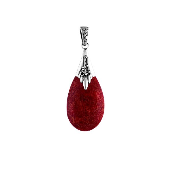 Sterling silver teardrop pendant with natural red coral, handcrafted Bali-inspired jewelry.