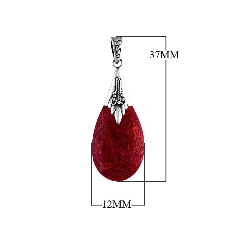 Sterling silver teardrop pendant with natural red coral, handcrafted Bali-inspired jewelry.