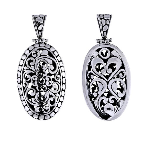 Handmade sterling silver oval filigree pendant with dotted border, artisan Bali jewelry design.
