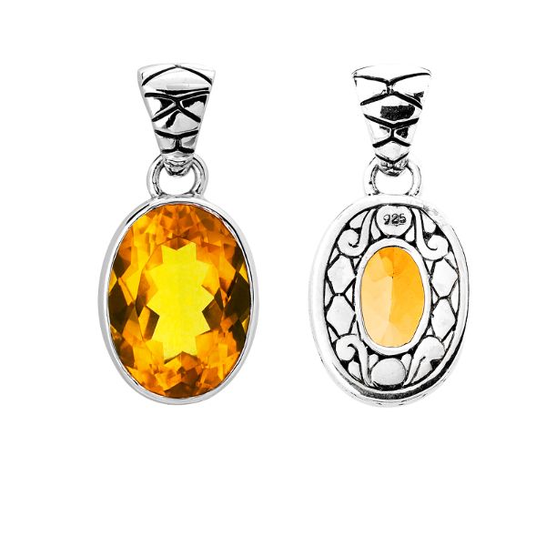 Handmade sterling silver pendant with oval-cut Citrine Quartz and artisan scroll back, Bali Quartz jewelry.