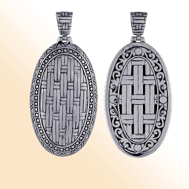 Artisan sterling silver oval pendant with woven texture and detailed borders.