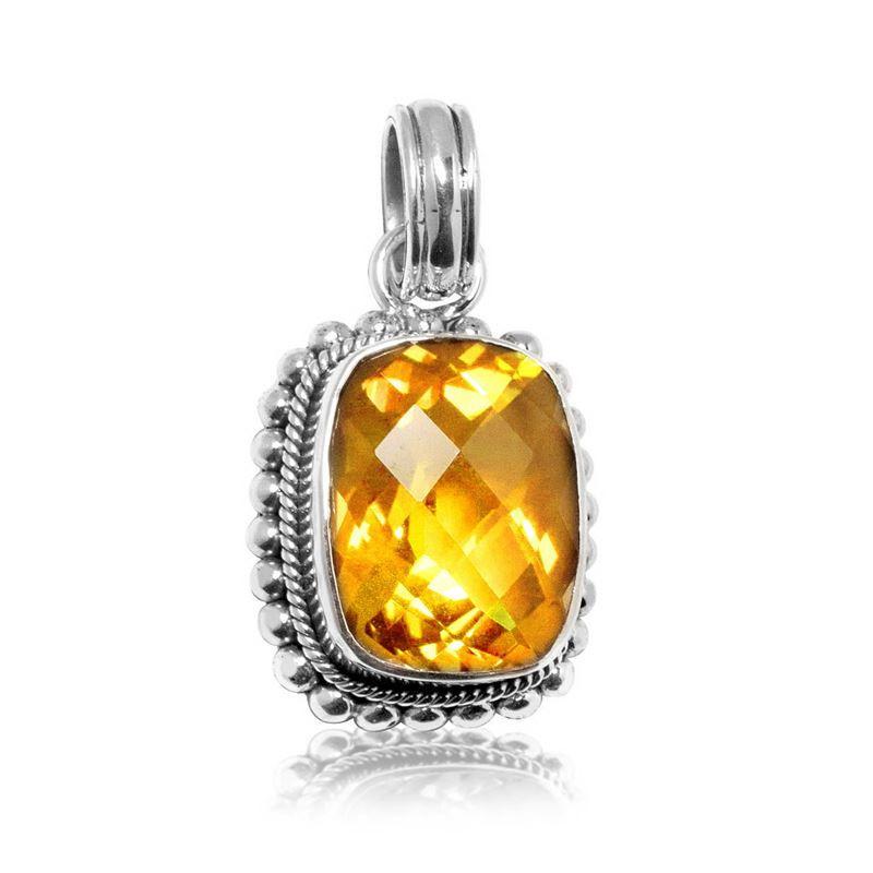 Handmade sterling silver pendant with faceted Citrine Quartz, artisan crafted in Bali
