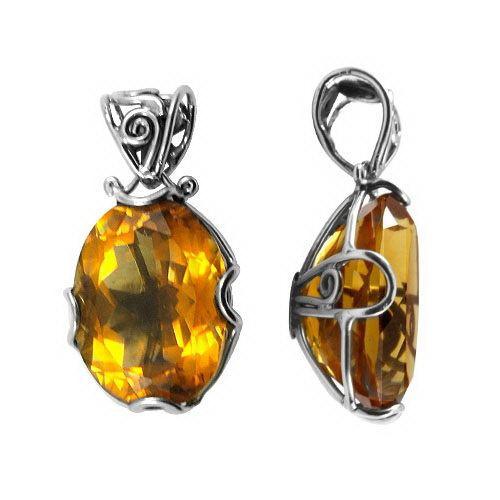 Handmade sterling silver oval pendant with faceted Citrine Quartz, artisan crafted in Bali