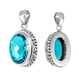 Handmade sterling silver oval pendant with faceted Blue Topaz Quartz, artisan crafted in Bali