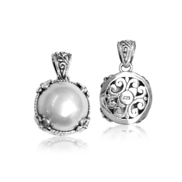 Handmade Mabe Pearl round pendant in sterling silver with Balinese scroll accents, artisan jewelry from Bali.