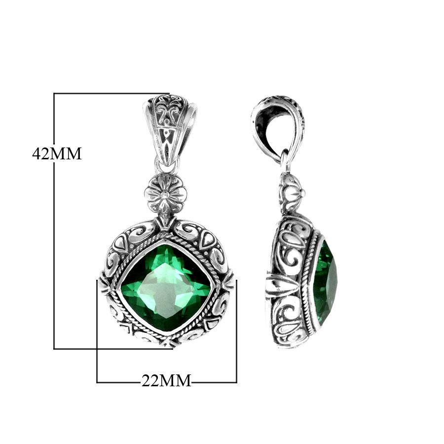 Elegant sterling silver pendant with cushion-cut green quartz, Balinese handcrafted with floral and rope carvings.