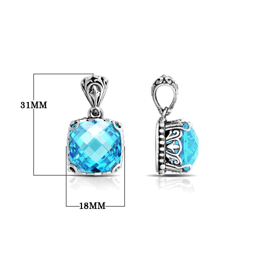 Sterling silver pendant with sparkling cushion-cut blue topaz quartz, Balinese handcrafted with scroll and bead detailing.