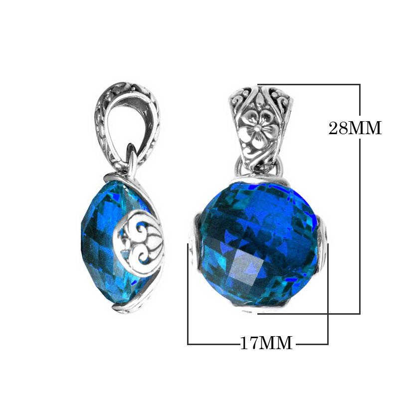 Handmade sterling silver pendant with faceted Blue Topaz Quartz and floral Balinese detailing, artisan crafted in Bali.