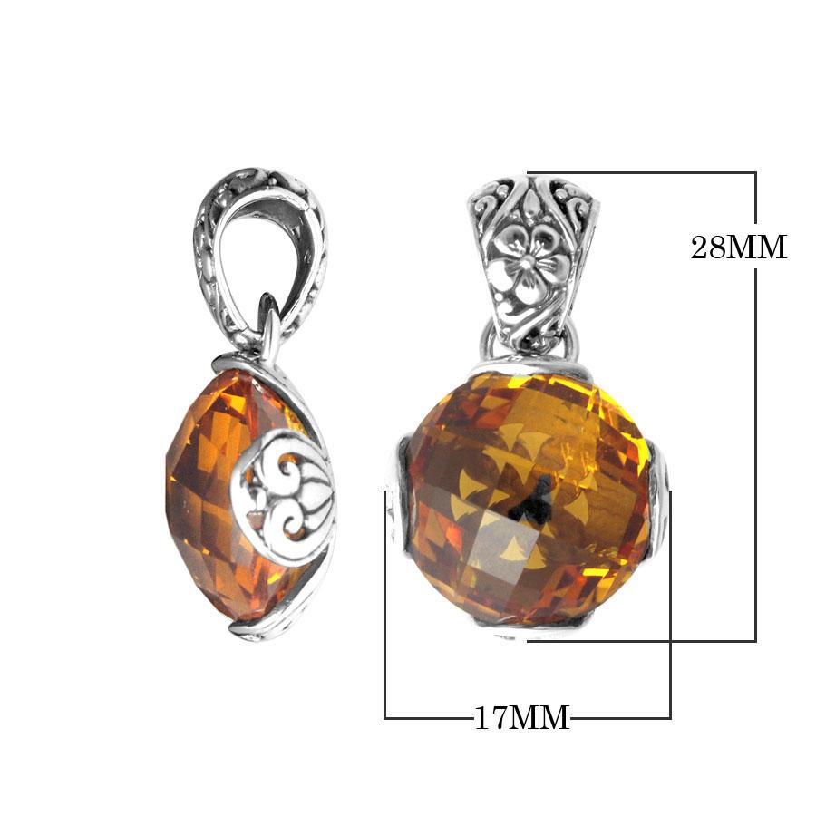 Handmade sterling silver pendant with faceted Citrine Quartz and Balinese floral swirl details, artisan crafted in Bali.