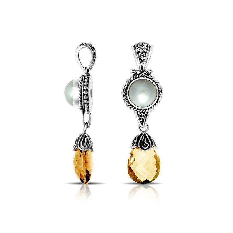 Handcrafted sterling silver pendant with mother of pearl and citrine quartz drop, made in Bali.
