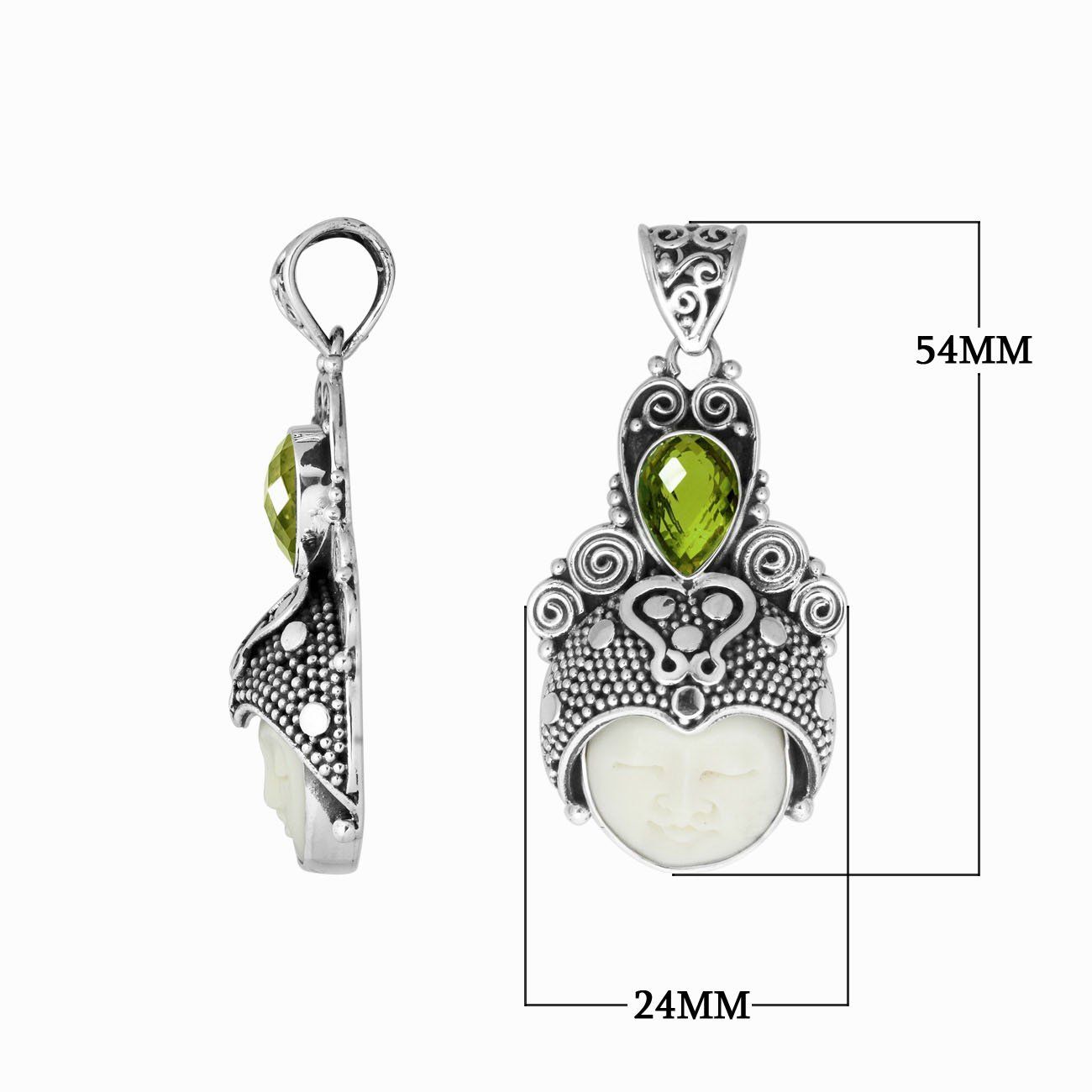 Balinese bone face pendant with peridot quartz in sterling silver, handcrafted jewelry.
