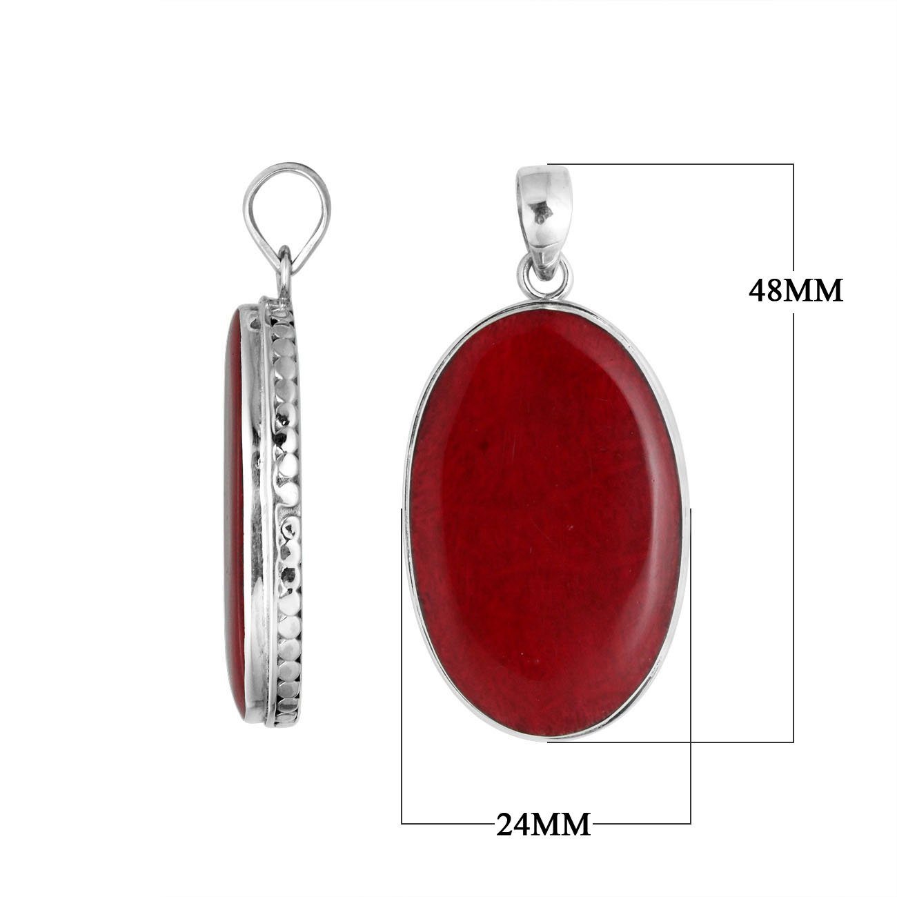Sterling silver oval pendant with red coral and hammered silver frame handcrafted in Bali