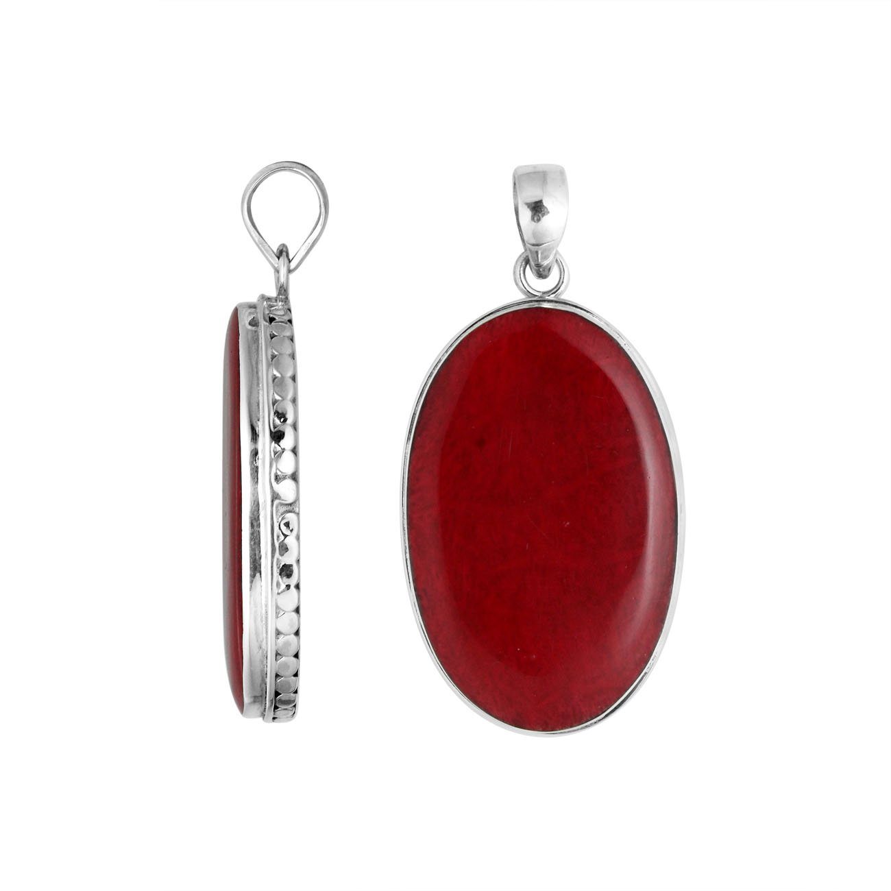 Sterling silver oval pendant with red coral and hammered silver frame handcrafted in Bali