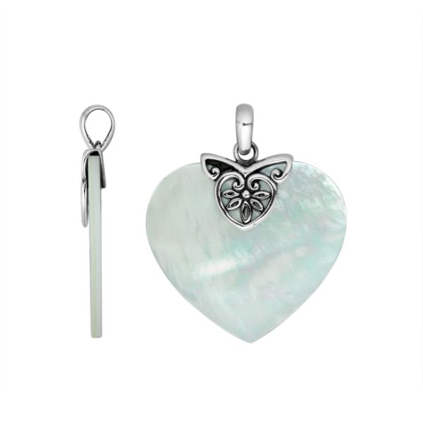 Handcrafted Sterling Silver Balinese Heart Pendant featuring lustrous Mother Of Pearl framed in detailed filigree silver work, designed for women who value timeless artistry and elegant jewelry craftsmanship.