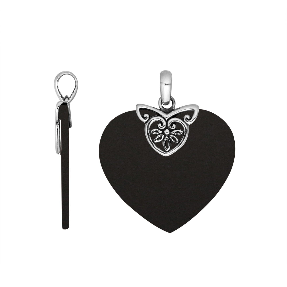 Handcrafted Balinese Sterling Silver Heart Pendant with lustrous Black Shell and delicate silver filigree detailing, designed for women who appreciate handcrafted artistry and refined jewelry elegance.