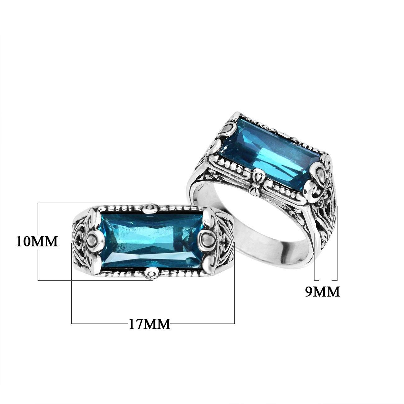 Sterling silver rectangular London Blue Topaz Quartz ring with faceted quartz and intricate Bali-inspired detailing, handcrafted artisan statement jewelry for women.