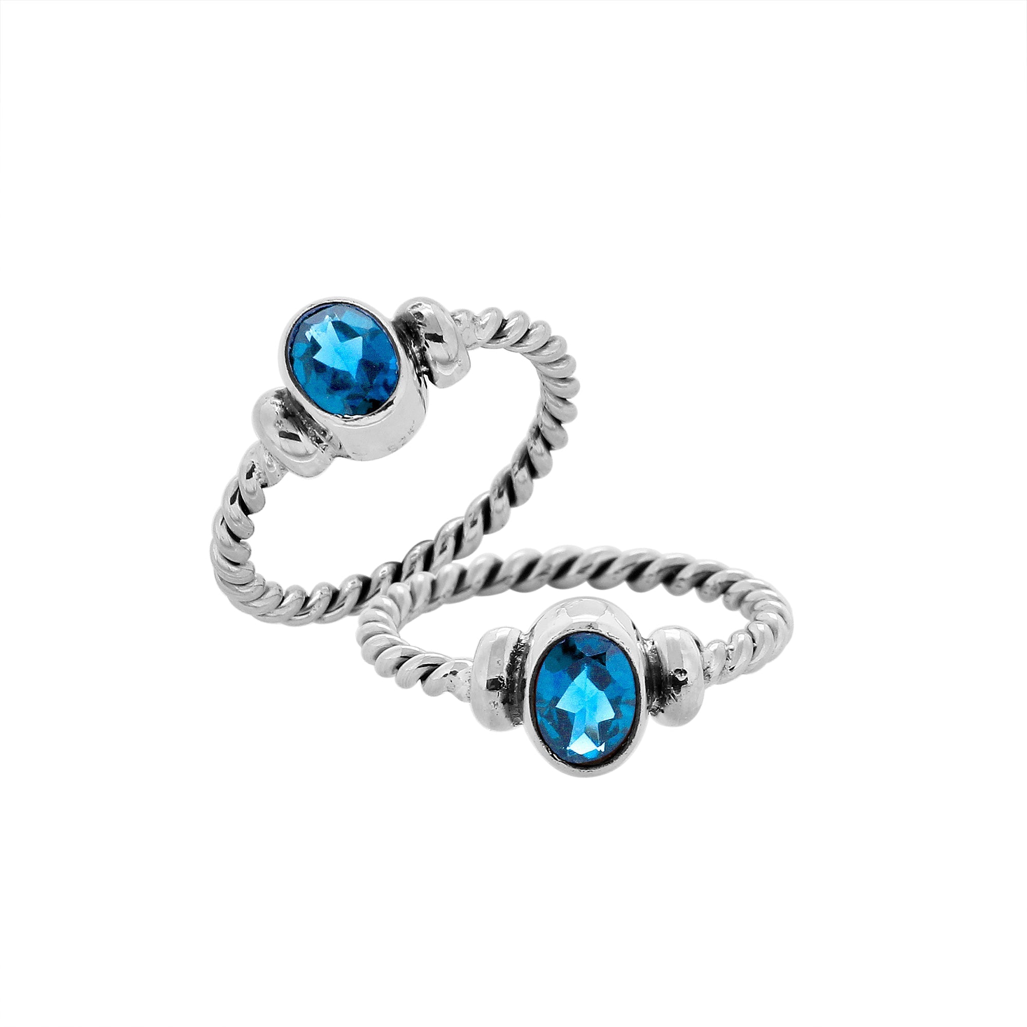 Sterling silver twisted band ring with oval faceted Blue Topaz Quartz, artisan handcrafted jewelry for women, elegant blue Quartz accessory.