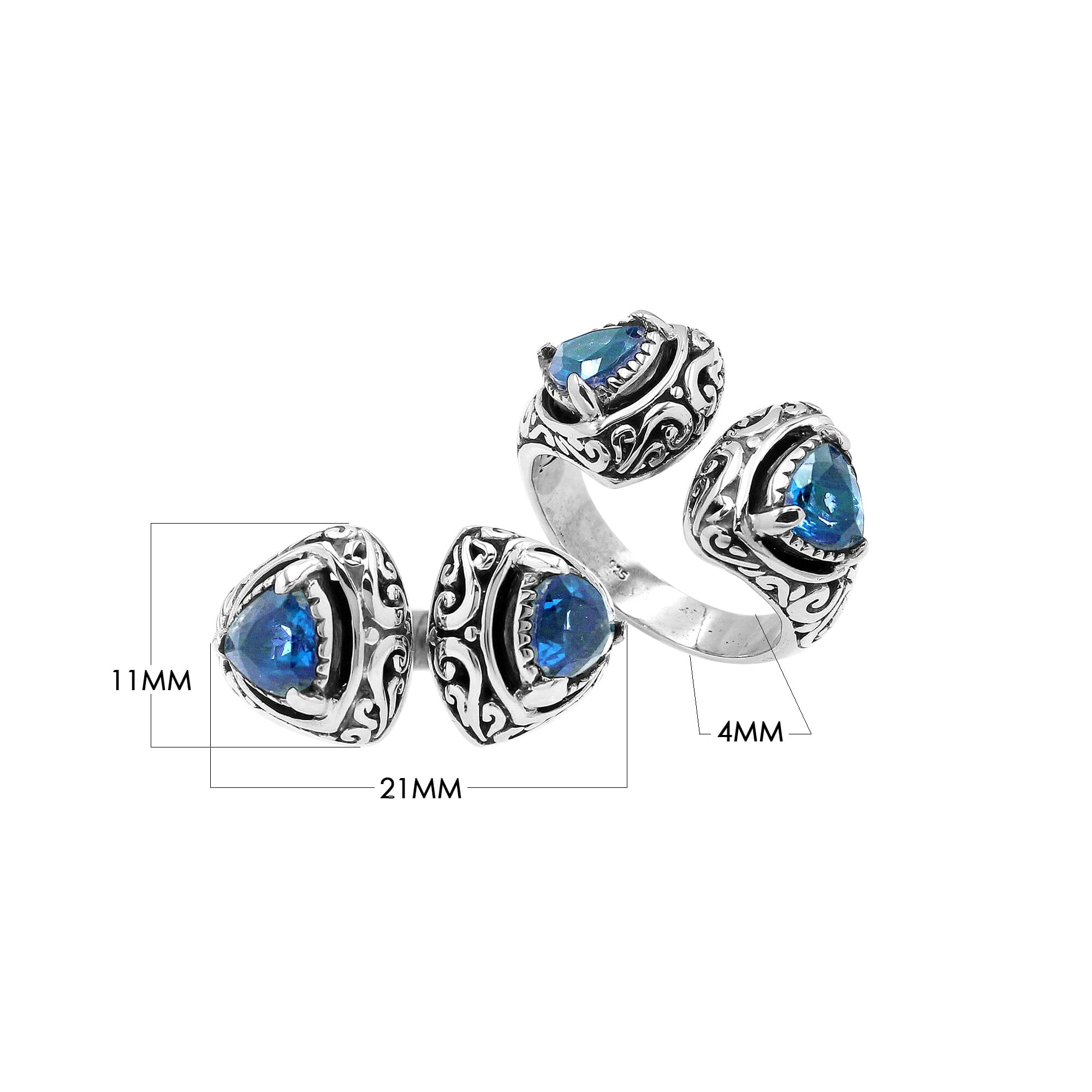 Sterling silver Bali scrollwork ring with trillion-cut Blue Topaz Quartz – artisan handcrafted statement jewelry for women.