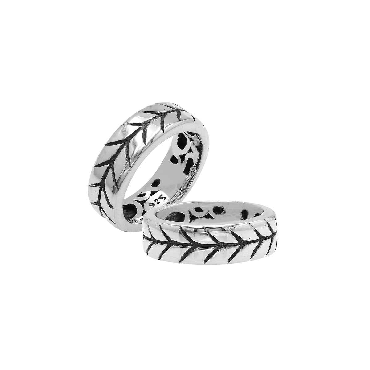 Handcrafted sterling silver band ring with detailed leaf pattern and oxidized finish, unisex artisan jewelry for everyday wear or gifting.